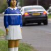 billy bollard on side of road near school