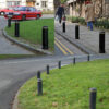 edgeminder plaster bollards on the side of a street