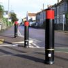 black bollards on street