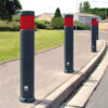 grey bollards on pathway