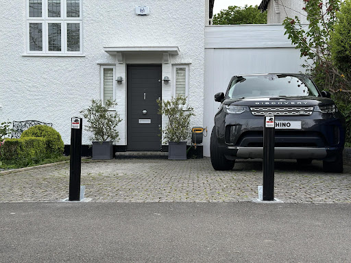 Two security bollards outside private house and driveway