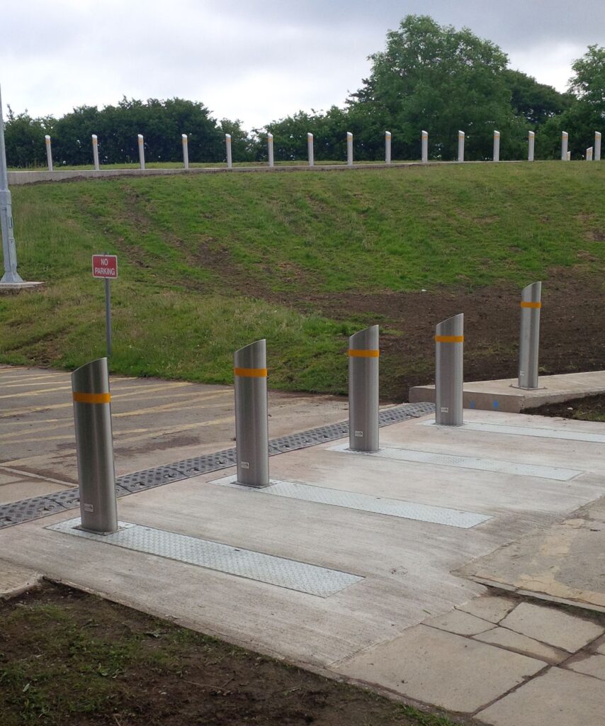 Row of slimline rising bollards