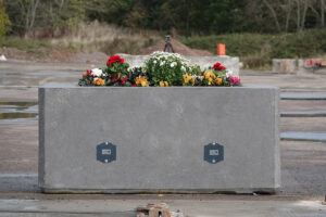 Planter bollard with flowers
